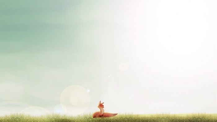 A happy fox sits in a grassy field under bright sunlight