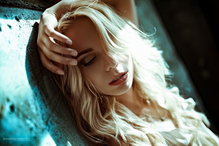 Woman with blonde hair and nose ring