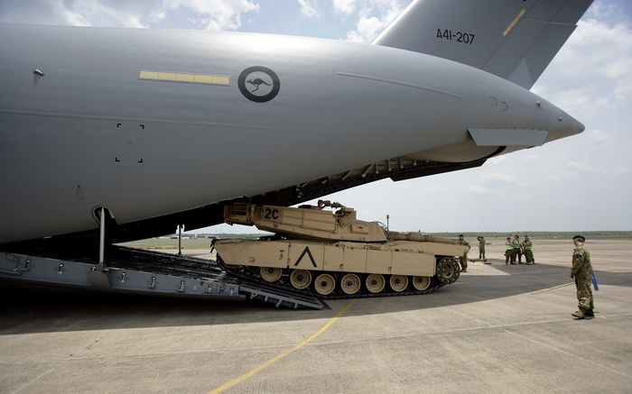 Boeing C-17 Globemaster III loading an M1 Abrams tank