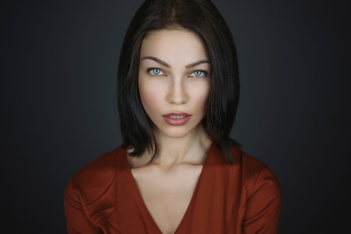Portrait of a woman with striking blue eyes