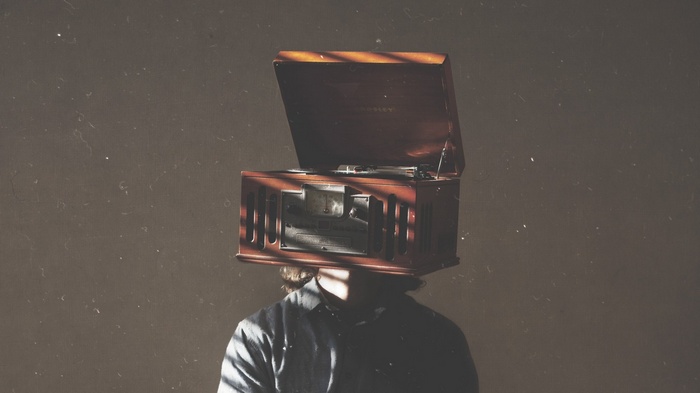 Man with a phonograph for a head