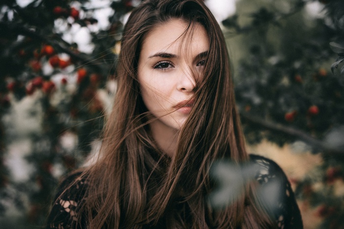 Portrait of a young woman with brown hair