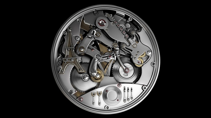 Watch movement with Eiffel Tower and guitar