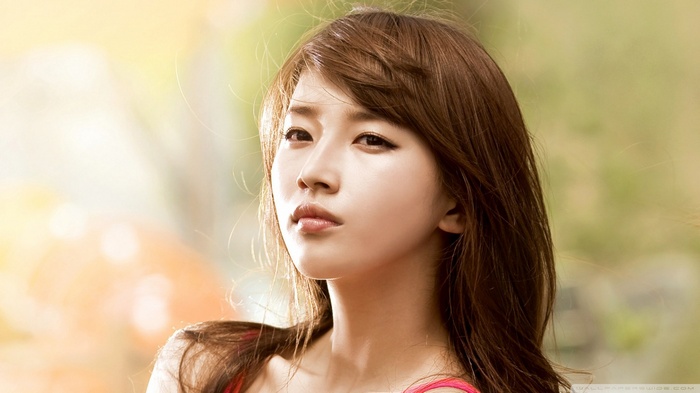 Asian woman with long brown hair