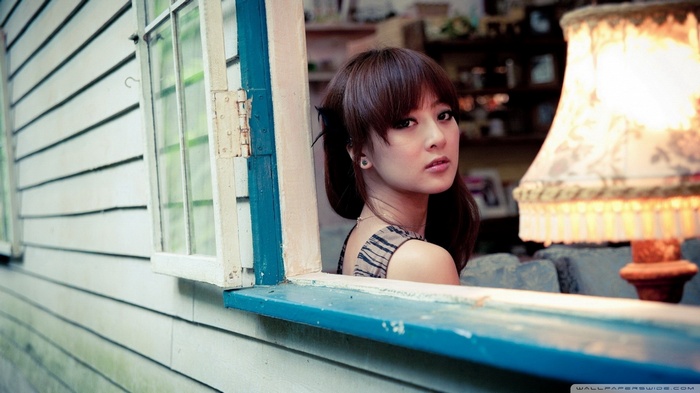 Mikako Zhang Kaijie looking out a window