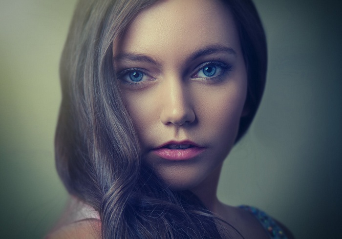 Portrait of a young woman with blue eyes