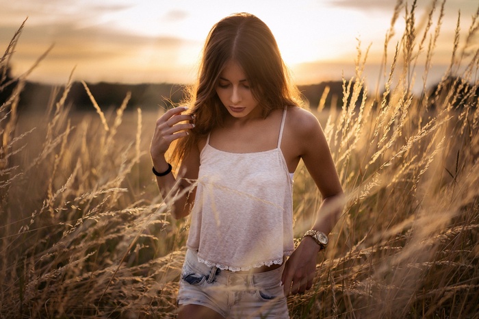 Sara Tessitore in a field at sunset