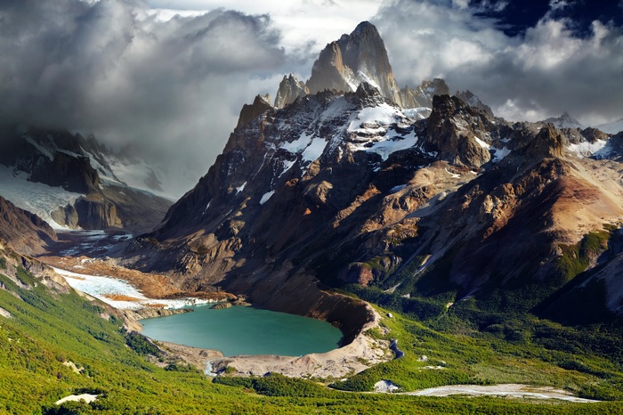 Majestic mountains surround a turquoise lake in Patagonia