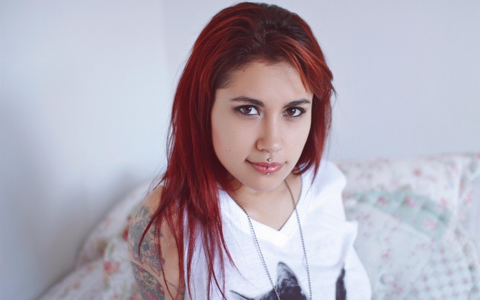 Ellys Suicide with red hair and tattoos