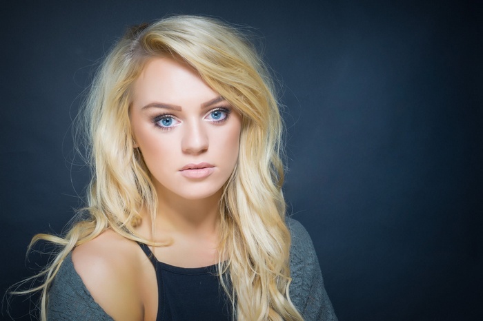 Portrait of a blonde woman with blue eyes