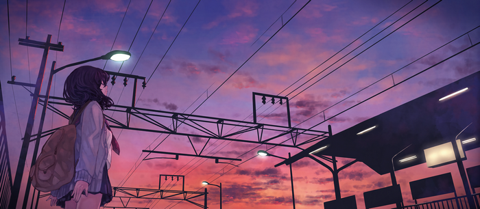 Girl at train station during sunset