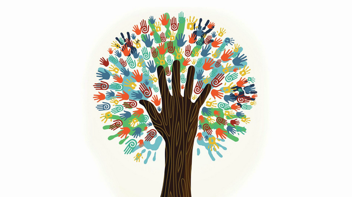 Tree made of colorful handprints and a large hand