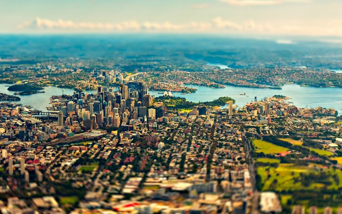 Tilt-shift aerial view of Sydney cityscape and harbor