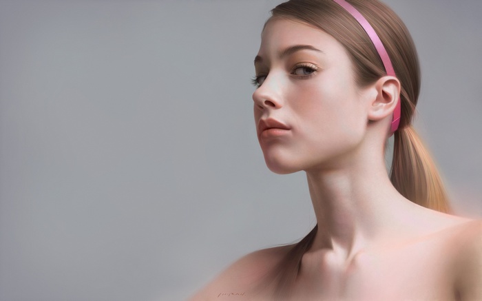 Portrait of a woman with a pink ribbon
