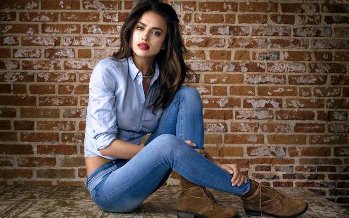Irina Shayk in blue shirt and jeans