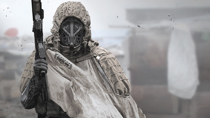 Futuristic soldier with a rifle and mask