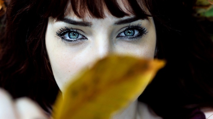 Susan Coffey with a yellow leaf