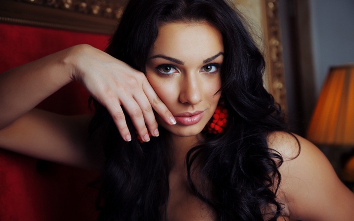 Woman with dark hair and brown eyes