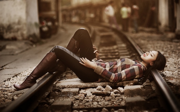 Asian, women outdoors, lying on back, urban, tights, people, long hair, women, brunette, shirt, depth of field, railway, stones, model, closed eyes, open mouth, knee-high boots, street