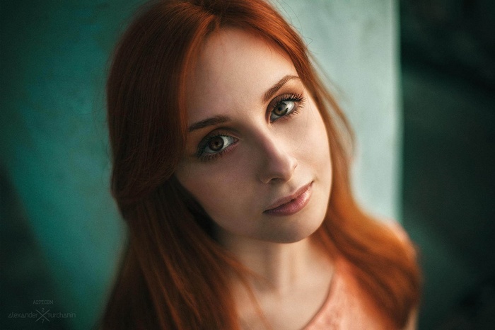 Portrait of a young redhead woman