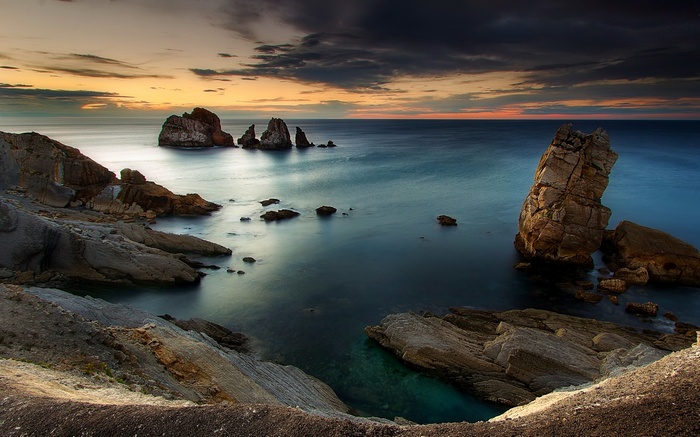 Sunset over the rocky coast of Spain