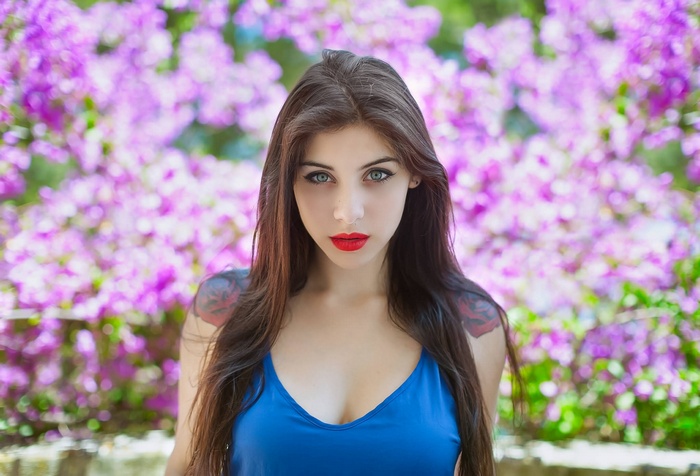 Woman with red lipstick and blue dress