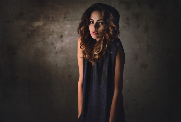 Woman with wavy hair and juicy lips