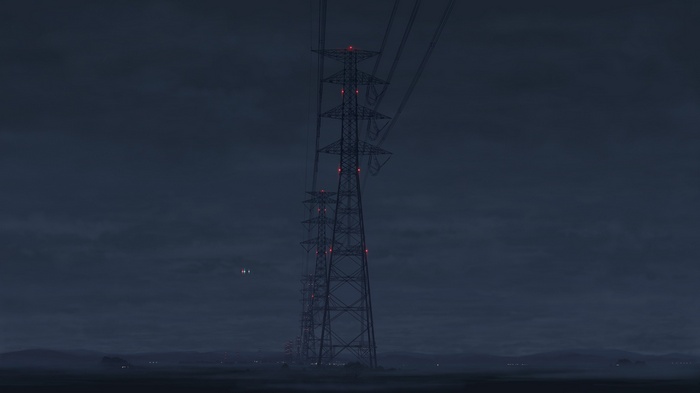 Power lines at night with red lights