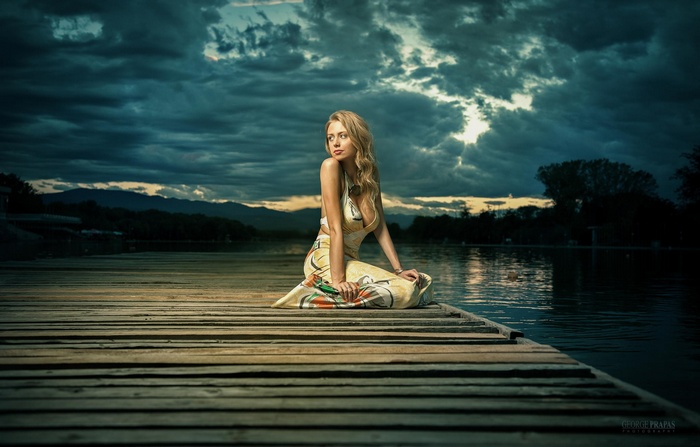 Karolina Debczynska on a pier by the lake