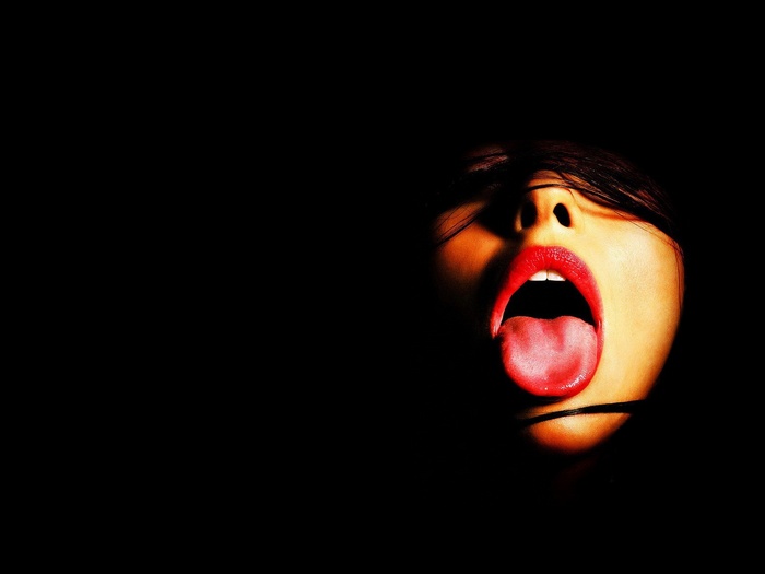 Woman with open mouth and red lips