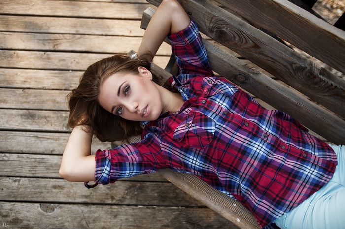 Portrait of a woman in a plaid shirt by Kirill Averyanov