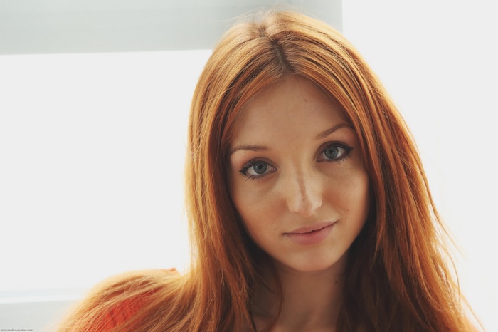 Michelle H. Paghie, redhead woman looking at viewer