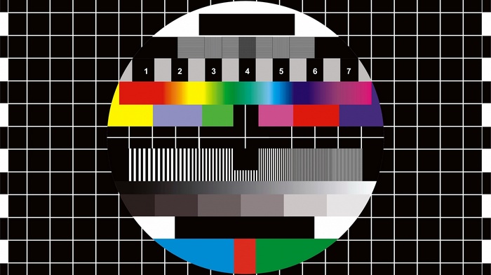 Monoscope test pattern with numbers and colorful bars