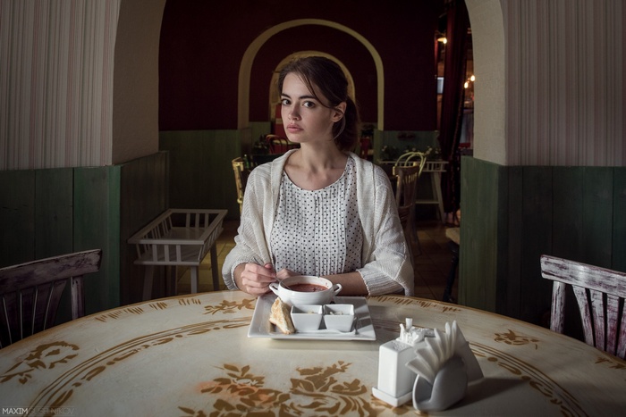 Lidia Savoderova eating soup in a restaurant