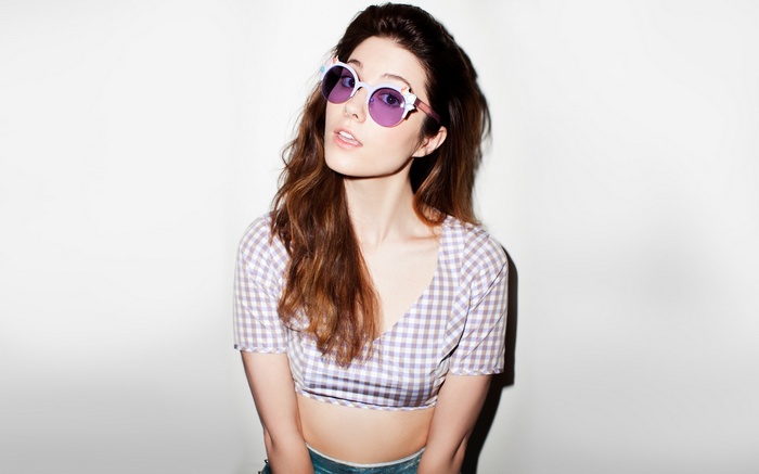 Mary Elizabeth Winstead wearing sunglasses and a checkered top