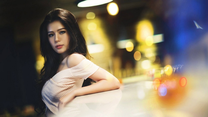 Portrait of an Asian woman with long dark hair