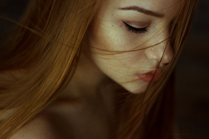 Portrait of a redhead woman with freckles