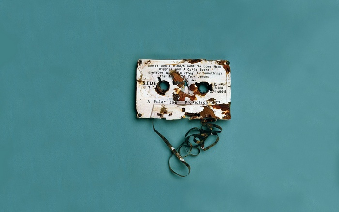 Damaged Cassette Tape with Song Titles