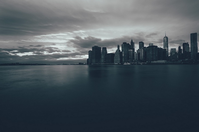New York City skyline across the water at dusk