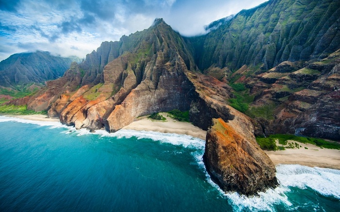 Aerial view of Na Pali Coast cliffs and ocean
