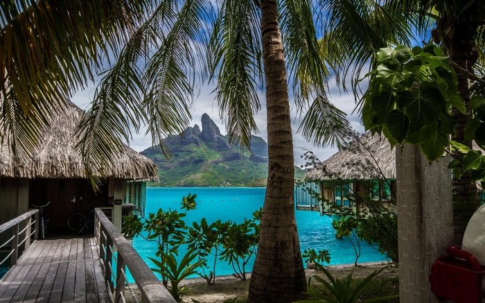 Overwater bungalows and Mount Otemanu in Bora Bora