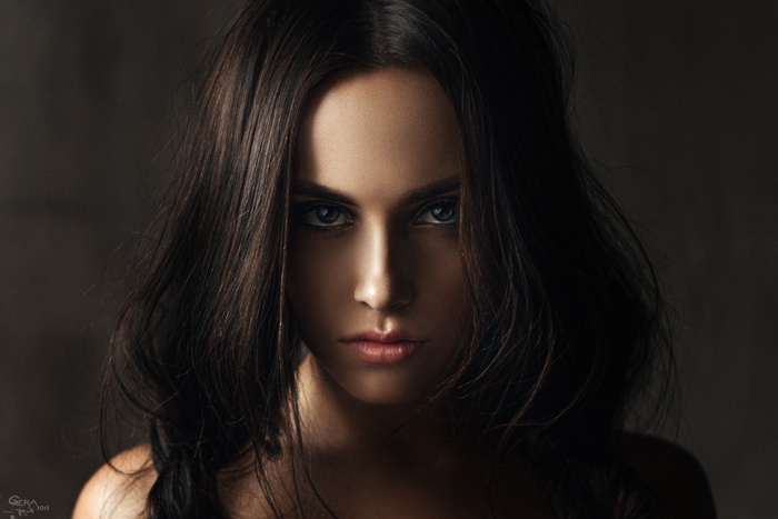 Portrait of a young woman with dark hair