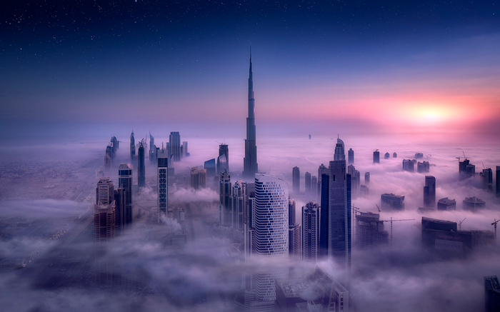 Dubai cityscape shrouded in mist with Burj Khalifa