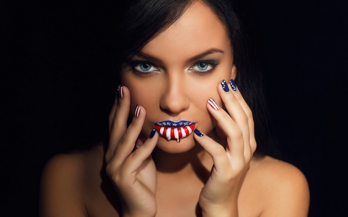 Woman with American flag makeup and nails