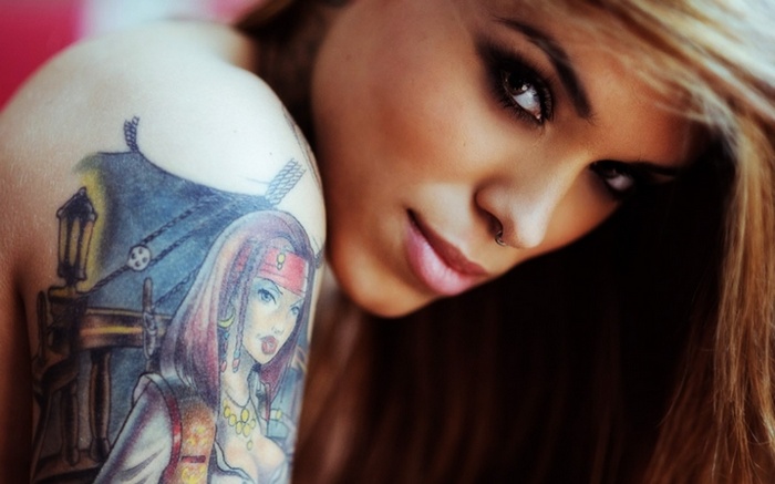 Arabella Drummond with a tattoo of a pirate woman