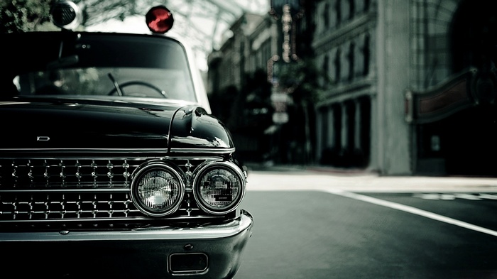 Vintage police car with red lights