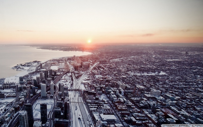 Toronto cityscape at sunset with snow
