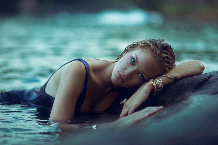 Lindsay W. in a river with wet hair and clothing