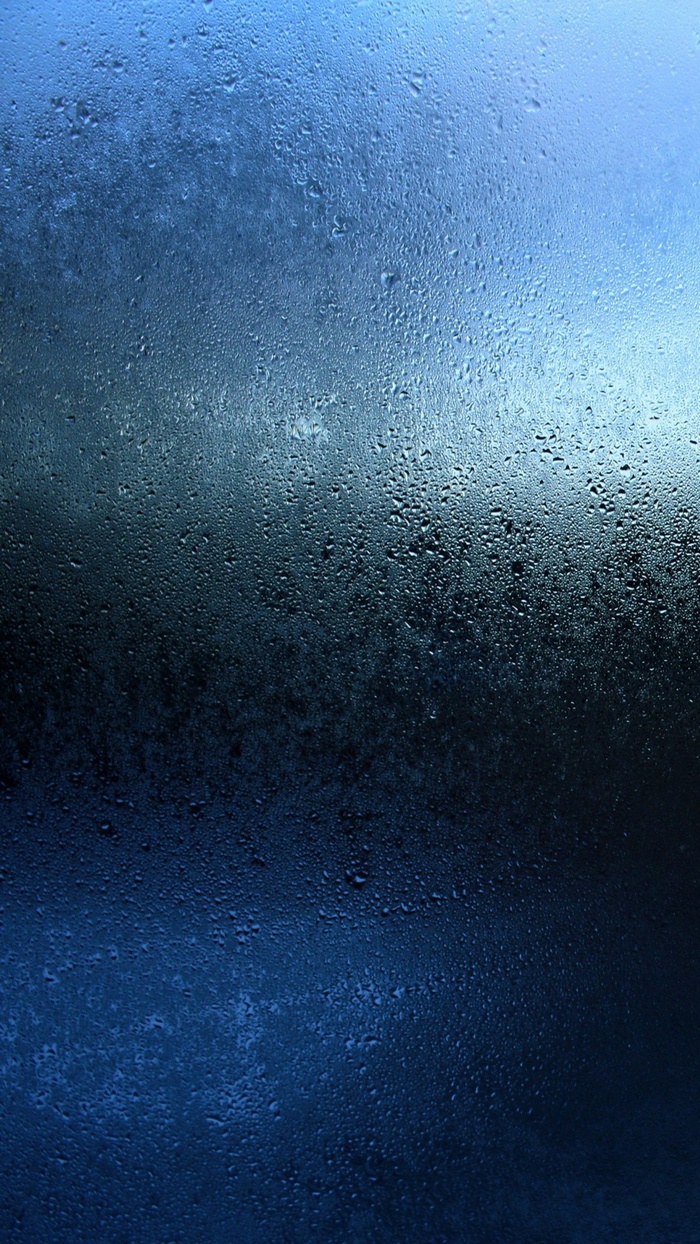Water droplets on a blue surface