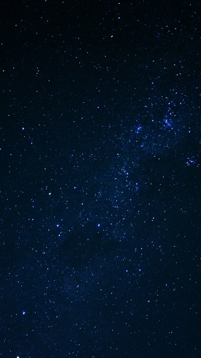 A dark night sky filled with countless stars